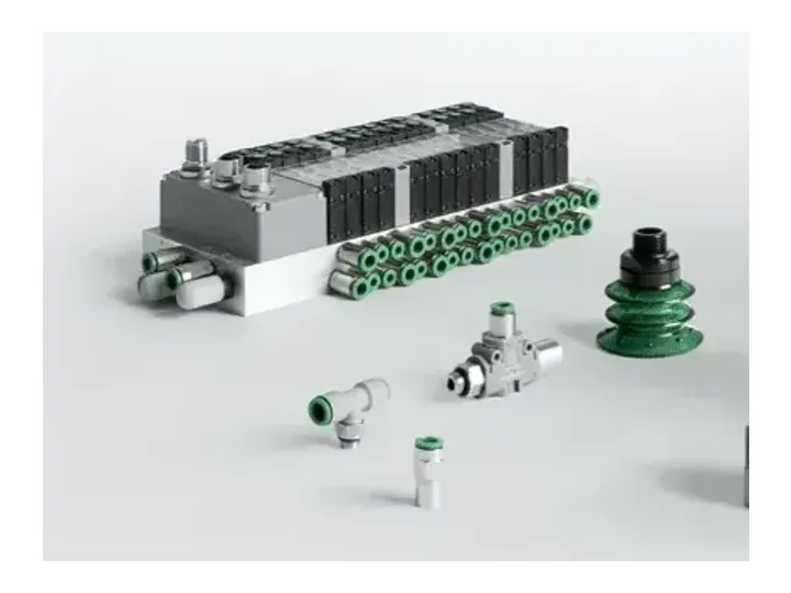 Pneumax solenoid valve island with push-in fittings and a vacuum suction cup